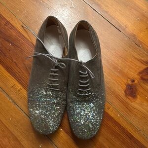 Maison Margiela
Paint splattered suede shoe
